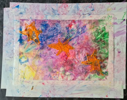 A blend of colours with three gold stars